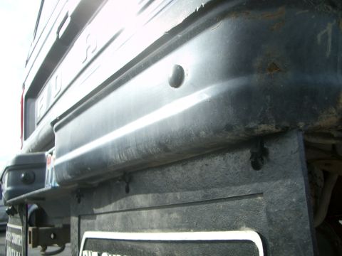 1992 Ford Ranger - Rear view of a 1992 Ford Ranger, showing the bumper and mud flap.