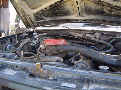 1988 Ford Bronco - Engine bay of a 1988 Ford Bronco, showing the air cleaner and intake system.