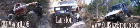 1981 Ford Bronco - Modified trucks navigate a rocky trail, their off-road capabilities.