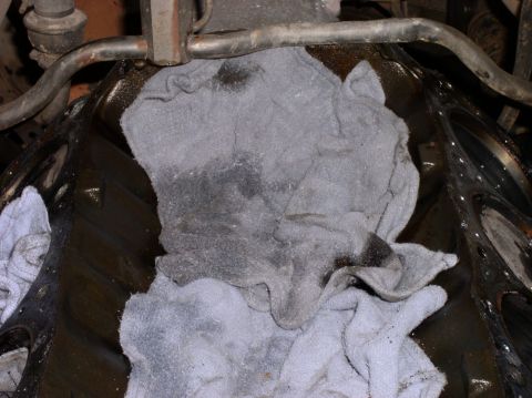 1988 Ford Bronco - Rags cover an engine block, likely during a repair process.