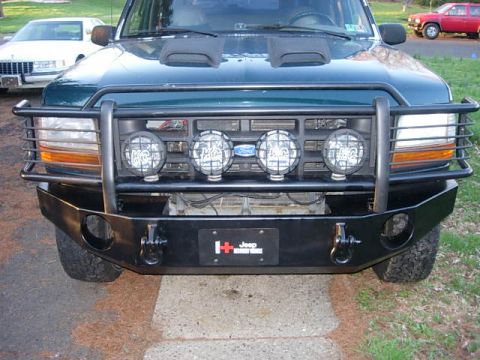 1993 Ford Bronco - Front view of a 1993 Ford Bronco equipped with an aftermarket bumper and auxiliary lights.