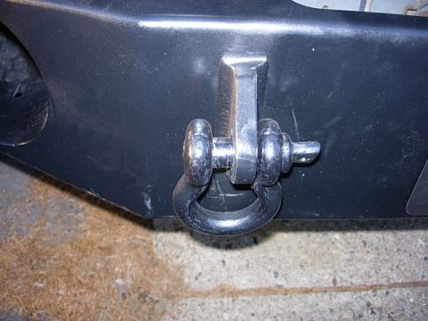 1993 Ford Bronco - Close-up of a tow hook on the front bumper of a 1993 Ford Bronco.