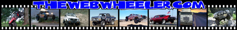 1993 Ford Bronco - A black pickup truck with a lifted suspension and large tires is shown in an off-road setting.