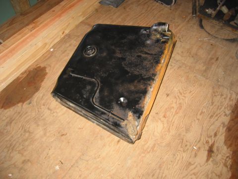 1991 Ford Explorer - This is a radiator part, not a 1991 Ford Explorer. It is shown on a wooden floor.