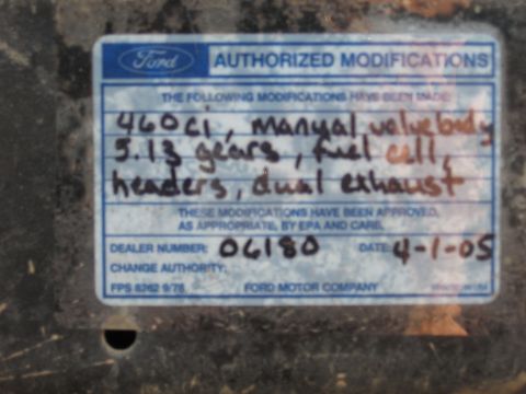 1977 Ford F-150 - This sticker lists modifications made to a vehicle, including engine and drivetrain upgrades, with a date of April 1, 2005.