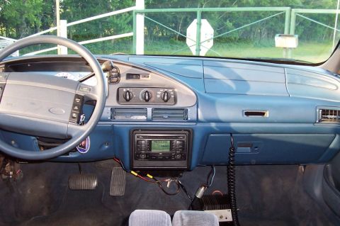 1993 Ford Taurus - Interior view of a 1993 Ford Taurus, highlighting the dashboard and controls.