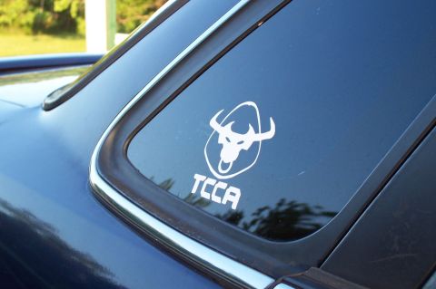 1993 Ford Taurus - Car window displays a TCCA bull logo sticker. Supermotors.net watermark is visible.