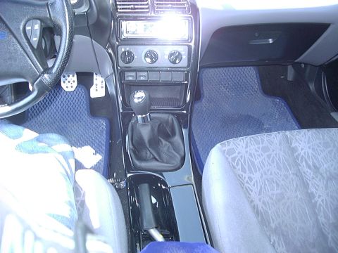 1995 Ford Probe - Interior view of a car, the dashboard, steering wheel, and seats.