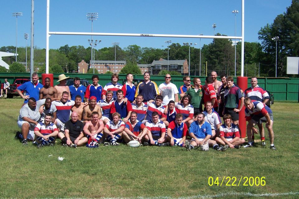 Rugby team group photo on a field under goalposts, dated 04/22/2006