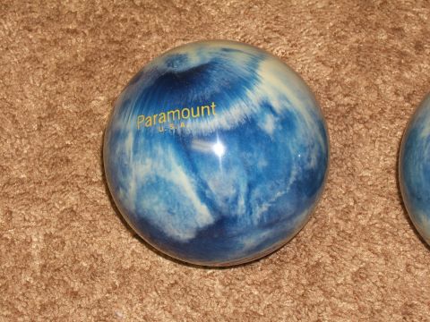 1998 Ford Taurus - A blue and white marbled bowling ball with the Paramount U.S.A. logo is shown on a carpeted surface.