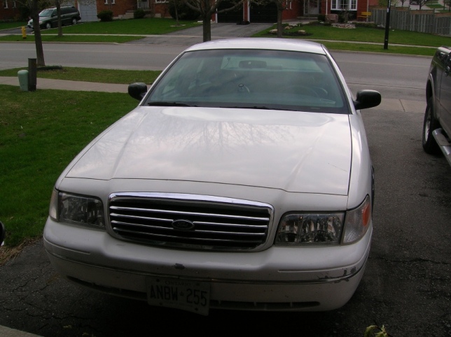White 1998 Ford Crown Victoria front view with chrome grille and license plate ANBW-255