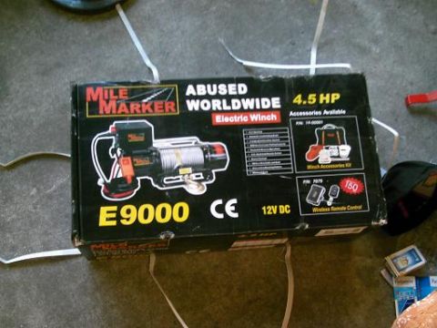 1986 Ford Bronco - Box for a Mile Marker E9000 electric winch, showing product details and accessories.