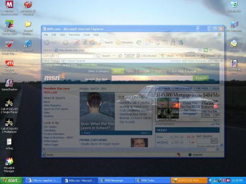 1988 Ford LTD Crown Victoria - A computer screen displays the MSN website, with a ghostly overlay of a vehicle.