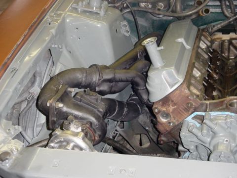 1995 Ford Mustang - Close-up of turbocharger and engine components, likely part of a custom build.