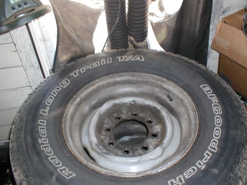 1979 Ford Bronco - Close-up of a BFGoodrich Radial Long Trail T/A tire and steel wheel.