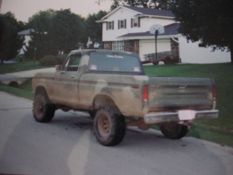1977 Ford F-150 - This 1977 Ford F-150 pickup truck is seen from the rear, sporting a camouflage paint scheme.