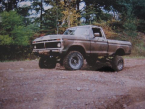 1977 Ford F-150 - This lifted pickup truck appears to be from the mid-1970s, likely a Ford F-Series.