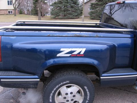 1995 GMC Sierra 1500 - Came with Rhino liner on the bed from a spray can. Sanded all that out, took rails off.