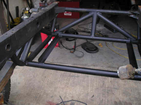 Custom roll cage welded to vehicle frame