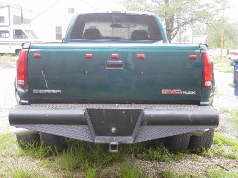 1995 GMC C/K Pickup - Rear view of a 1995 GMC C/K Pickup truck, showing the Sierra and GMCTruck badging.