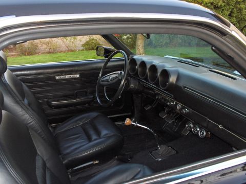 1968 Ford Ranchero - Interior view of a 1968 Ford Ranchero, its dashboard, steering wheel, and seating.