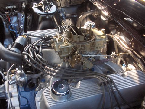 1968 Ford Ranchero - Engine bay detail showing a carburetor, distributor, and valve covers.