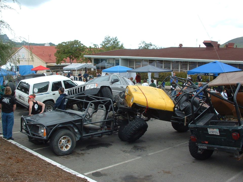 Custom off-road buggy with yellow hood, front view