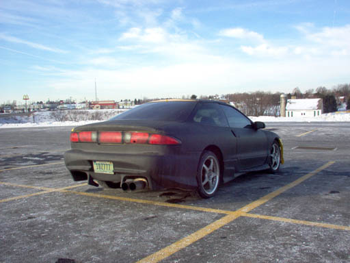 1994 Ford Probe parked in a lot, rear view