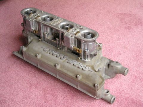 2000 Ford Mustang - This intake manifold features "BOSS" cast into its side and a "Ford" logo on the carburetors.