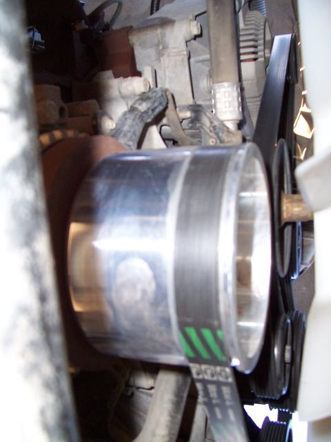 2003 Ford Ranger - A vehicle's engine belt and pulley system are visible in this close-up shot.