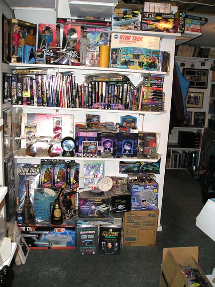 1984 Pontiac Fiero - A room filled with various Star Trek merchandise, including toys, models, and media.