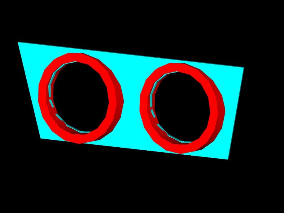 two red rings on a blue background, likely headlight bezels