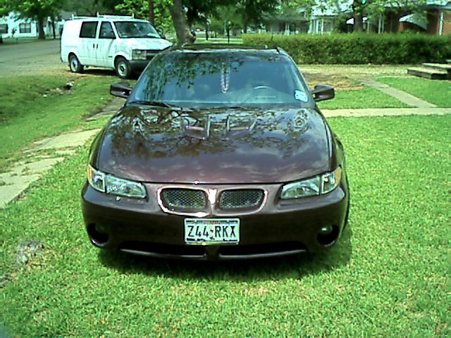 Maroon 2002 Pontiac Grand Prix front view with license plate Z44-RKX