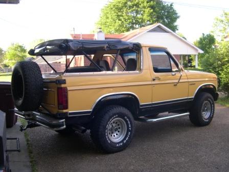 1982 Ford Bronco - This Ford Bronco features a removable soft top, exposing the interior roll cage and seats.
