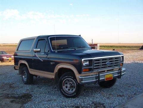 1986 Ford Bronco - This 1986 Ford Bronco is shown in a 3/4 front view, parked outdoors.