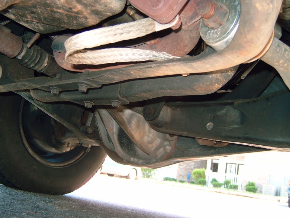 Undercarriage view of suspension and exhaust components