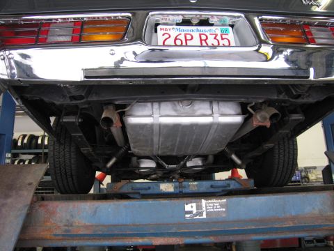 1978 Dodge Monaco - Underside view of a 1978 Dodge Monaco, revealing its fuel tank and exhaust system.