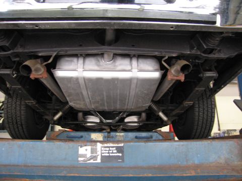 1978 Dodge Monaco - Undercarriage view of a 1978 Dodge Monaco, highlighting the fuel tank and exhaust system.