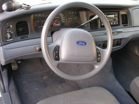 2001 Ford Crown Victoria - Yes, it has cruise control and note the alarm's red LED.