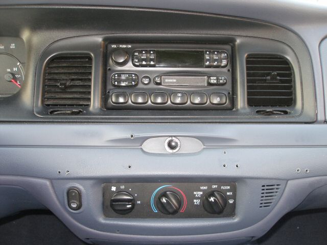 2001 Ford Crown Victoria interior dashboard with radio and climate controls