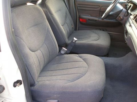 2001 Ford Crown Victoria - Interior view of a 2001 Ford Crown Victoria, showing the front seats and dashboard.