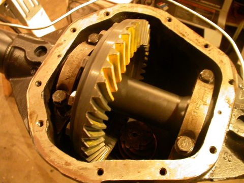 1990 Ford Bronco - Close-up of differential gears within an open housing, showing part number 103027.