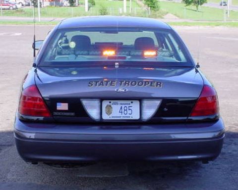 2001 Ford Crown Victoria - Rear view of a 2001 Ford Crown Victoria police car, marked as "STATE TROOPER".