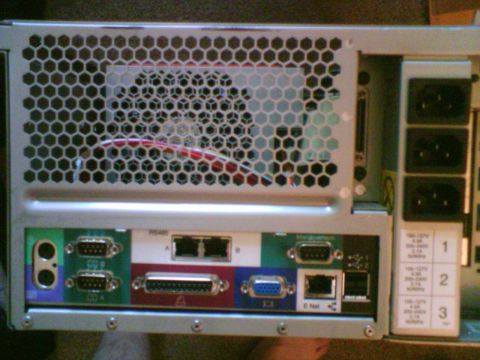 1985 Ford F-150 - Computer server rear panel with multiple input/output ports and power connectors.
