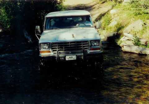 1979 Ford Bronco - This 1978 Ford Bronco is navigating a water crossing on a dirt road.