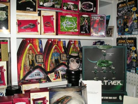 1984 Pontiac Fiero - Collection of Star Trek merchandise, including action figures and display items.
