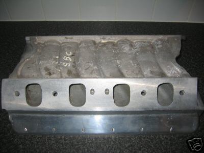 1972 Ford Ranchero - Aluminum intake manifold with "SBC" written on top. Supermotors.net logo visible.