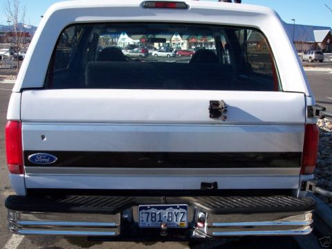 1994 Ford Bronco - The rear of a Ford Bronco shows its taillights, bumper, and a Colorado license plate.
