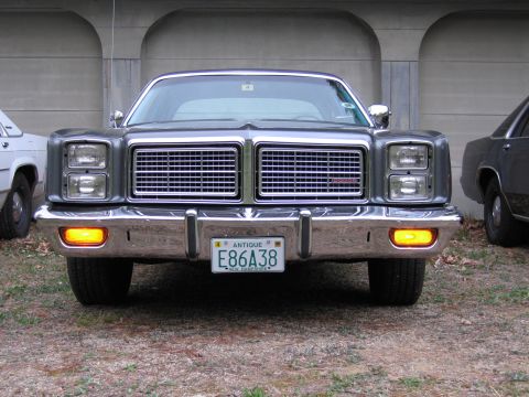 1991 Ford LTD Crown Victoria - 1977 Dodge Monaco front end with dual grilles and quad headlights.