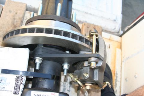 1992 Ford Bronco - Rear disc brake assembly for a Ford Bronco, showing the caliper and rotor components.